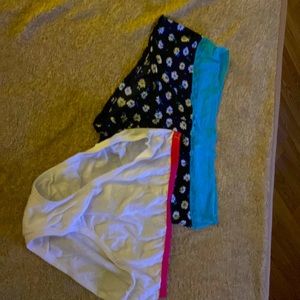 2 panties one white with pinklace and one black with white daisy’s and bluelace